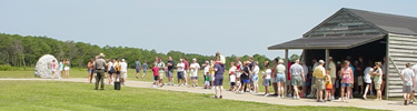 visitors at camp building